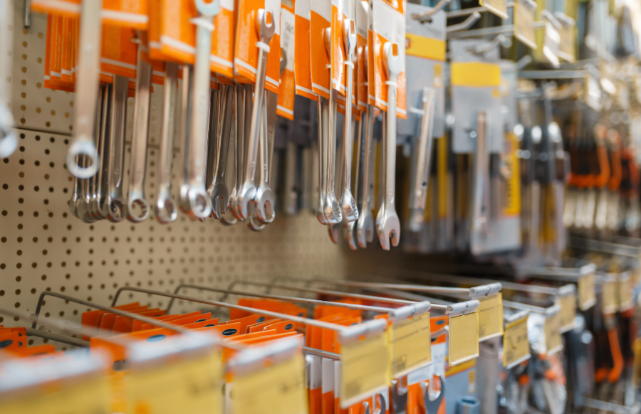 hardware store assortment, shelf with wrenches, building tools choice. 